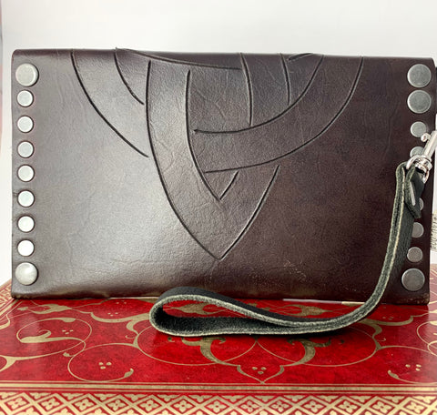 Hand Carved Dark Brown Trinity Knot Clutch In Vegetable Tanned Leather
