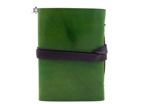 Mushrooms nested in Burr Oak leaves under a Pine Tree forest green leather journal